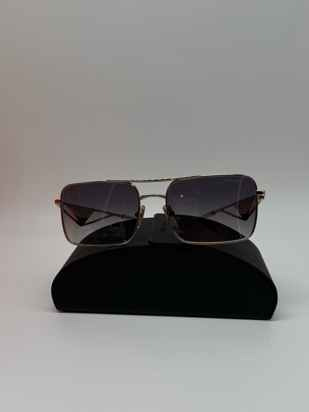 Prada Gold Metal Sunglasses with Gray Gradient Lenses